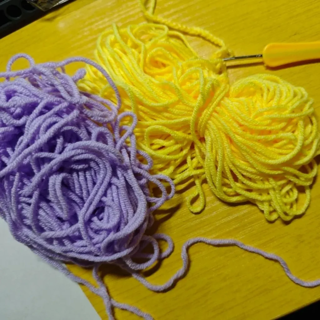 Crochet Kits for Beginners: What Actually Helped Me Start 5 beginner crochet yarn practice with loose and tangled skeins on a table