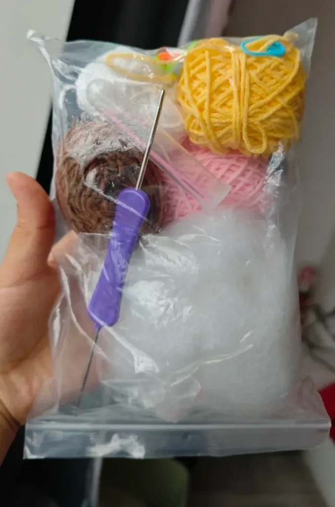 Crochet Kits for Beginners: What Actually Helped Me Start 2 crochet kit for beginners showing yarn, hook, stitch markers, and stuffing