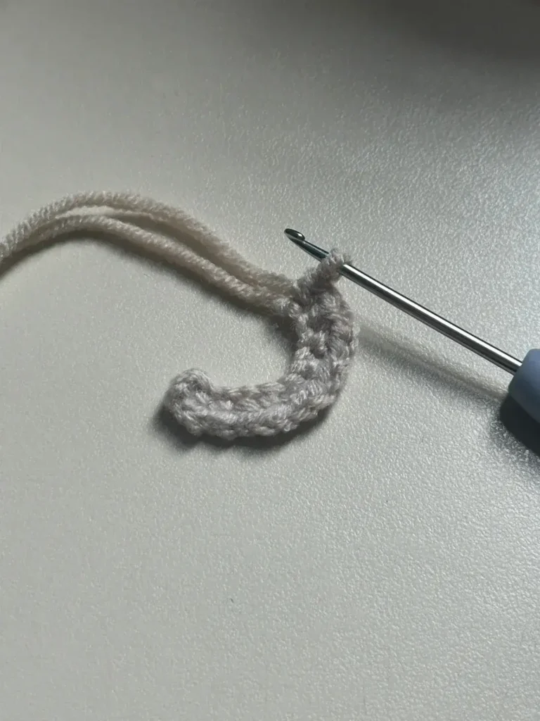 Why are my 10 single crochet stitches curved? Is this normal?