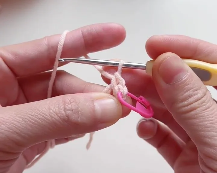 Continue working 5 single crochet stitches. Continue working 5 single crochet stitches.