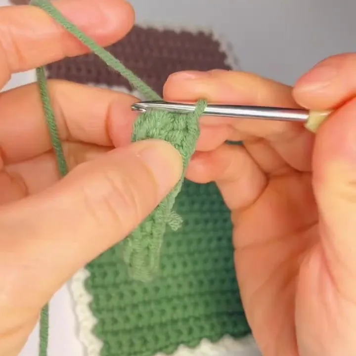 Finish with an Increase In the last stitch, make an increase:Work 2 single crochet stitches into the same stitch.