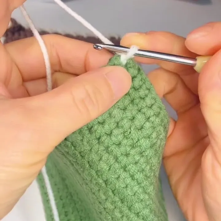 Join a New Color with a Slip Stitch Switch to a new color of yarn.Insert your hook into the stitch, pull the new color through, and make one slip stitch to join the yarn.