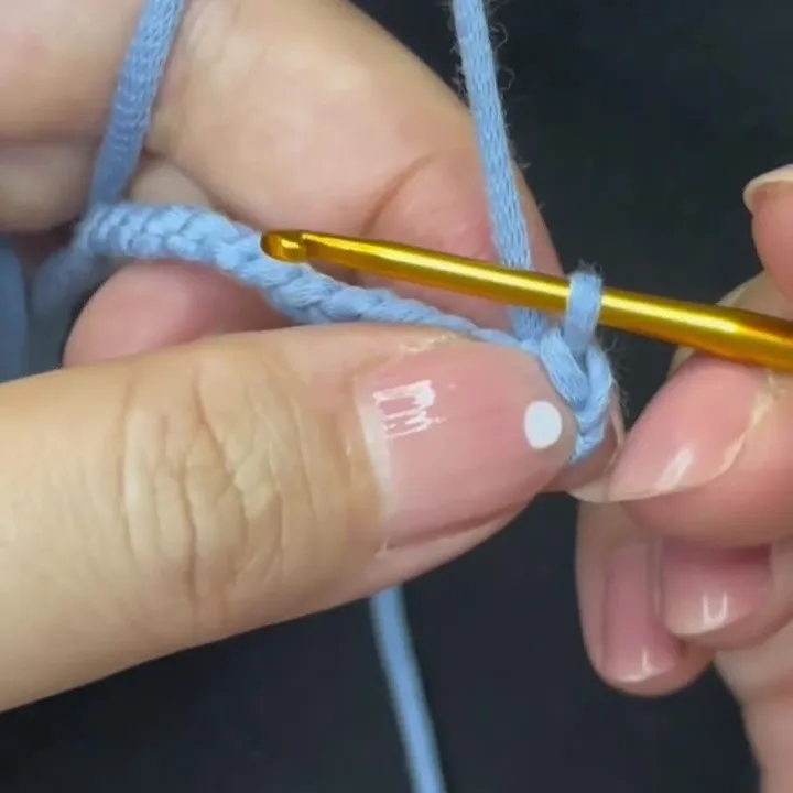 Work a slip stitch into the second-to-last stitch.