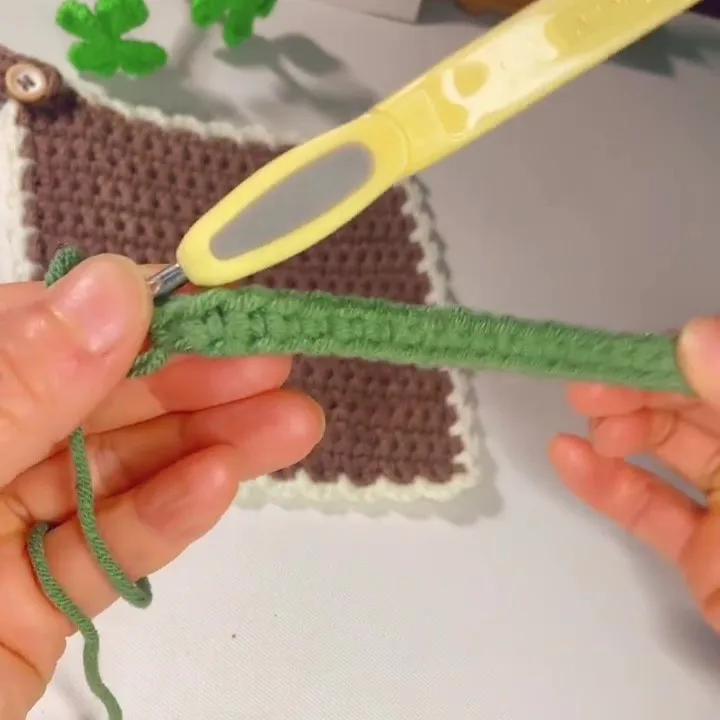 You have now completed Row 2. You have now completed Row 2.There should be 20 single crochet stitches across the row, all worked into the back loop only.