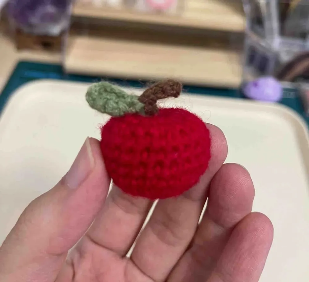 Crochet Apple ๐ Easy Mini Amigurumi Apple for Beginners 1 small red crochet apple amigurumi with leaf and stem