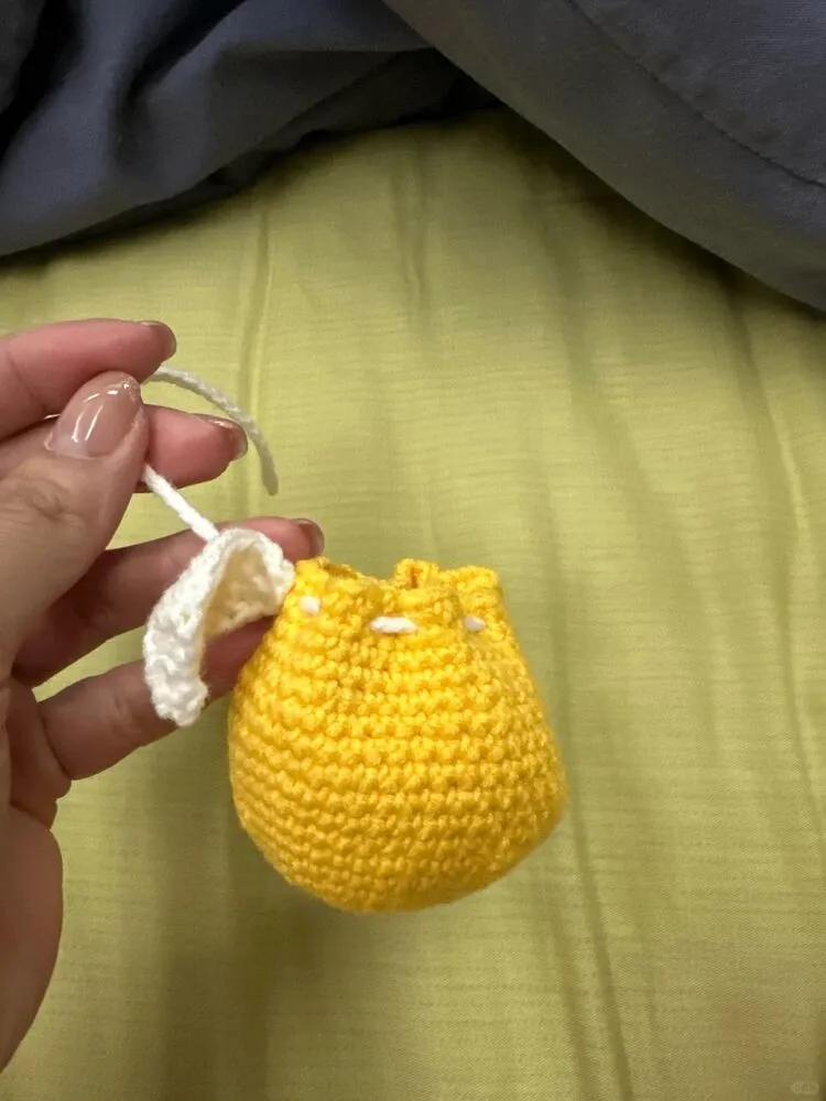 Crochet Orange Drawstring Pouch (Cute Earbud Case Pattern) 6 I can’t figure out the drawstring and my Round 20 stitches look messy