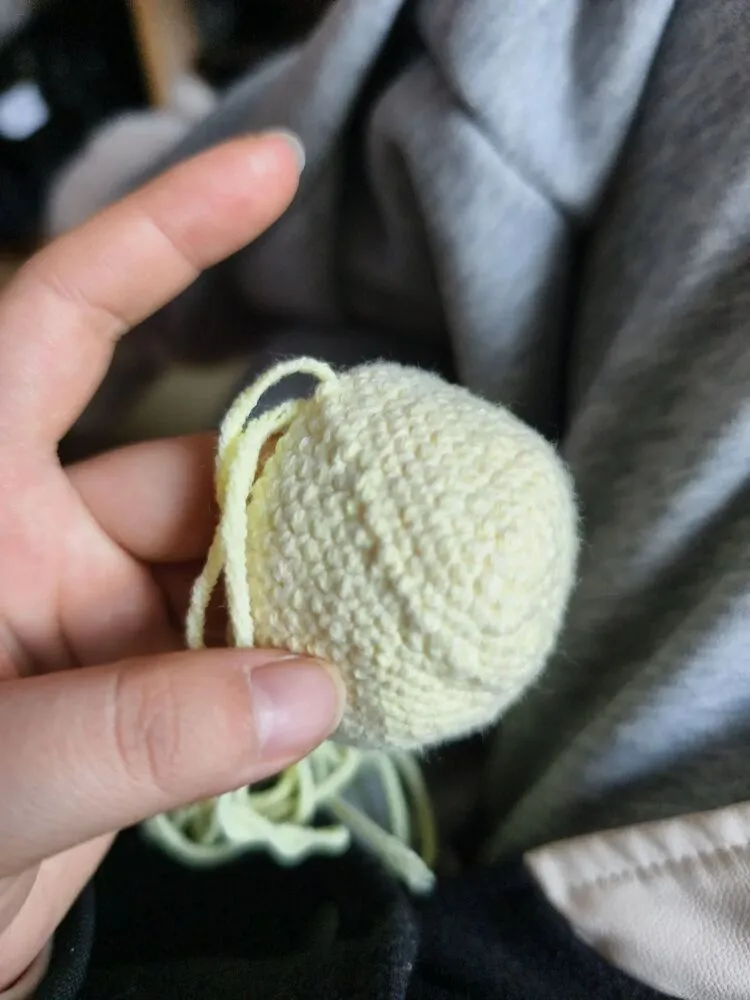 Crochet Orange Drawstring Pouch (Cute Earbud Case Pattern) 5 Why does a raised line appear where I slip stitched