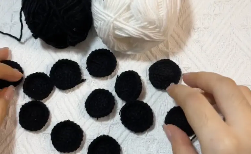Mini Crochet Soccer Ball Pattern: The Layout Is the Real Trick 1 Black crochet pentagon pieces for making a mini crochet soccer ball